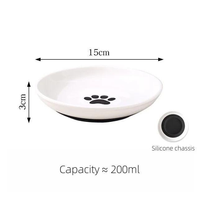 White pet bowl with black paw print design, measurements, and capacity information on a white background.